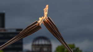 Olympic and Hiroshima Peace flames united for peace